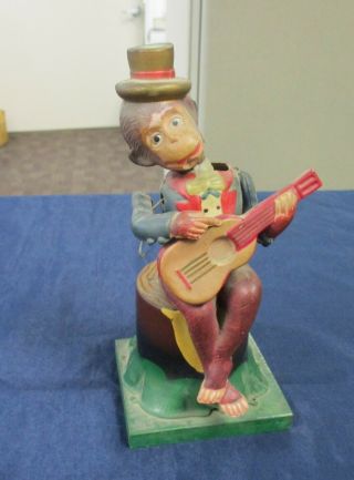Vintage Celluloid & Tin Litho Wind Up Monkey On A Stump Playing Guitar