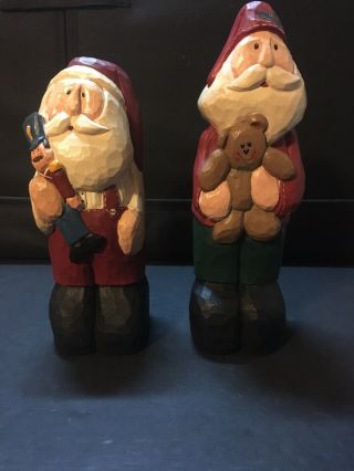 Two Painted Wood Folk Art Santa Claus Statues Figurines