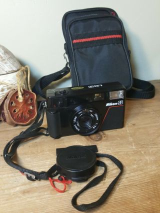 Vintage Nikon L35 35mm Slr Film Camera W Flash