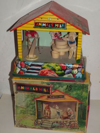 Red China Animals Mill Vintage Tin Toy