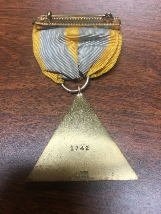 Scarce WWII era Minnesota National Guard medal for Good Conduct numbered 2