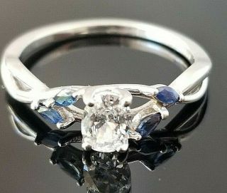 Petite Vintage Oval Solitaire Blue Sapphire 18k White Gold Ring