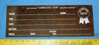 The Curtiss “complete Cow” Breeding Program Pressed Board Sign Plaque