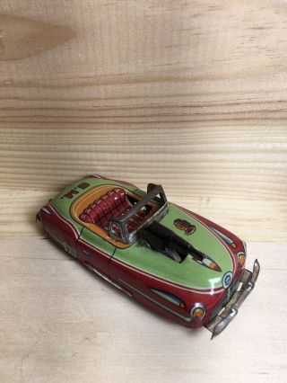 Vintage Tin Litho Friction Tin Toy Car G.  M.  Machine Gun Friction Powered Japan