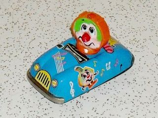 Vintage Marx Tin Litho Friction Car 1968 With Clown Face And Musical Notes