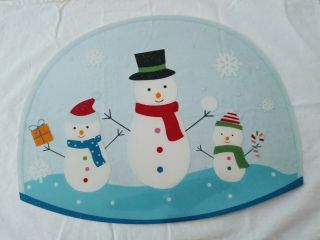 Set Of Four Holiday Snowmen Plastic Placemats