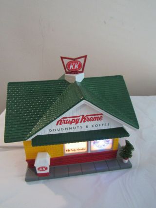 The Snow Village - Dept 56 Krispy Kreme Doughnut - Lights Up Spinng Logoi