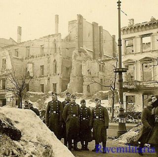 Occupation Luftwaffe Soldiers Posed On Bombed Street; Warschau,  Poland