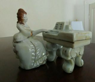 Occupied Japan Two Piece Set Of " Colonial Lady Playing Piano " Figurines