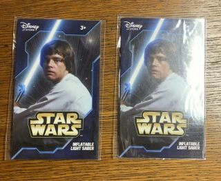 Two (2) Star Wars Disney Store Inflatable Lightsaber Luke Skywalker