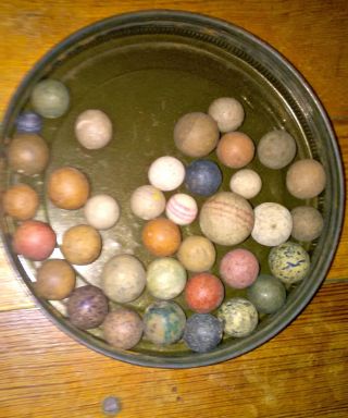 34 Antique Clay Marbles