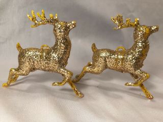 2 Vintage Yellow Plastic Gold Glitter Reindeer Christmas Tree Ornaments 3.  25 " H