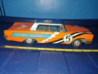 1960s Tin Friction Ford Time Bomb Race Car 10 1/2 Inch