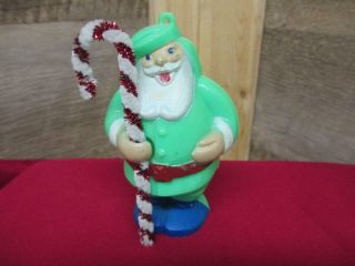 Vintage 3 - 1/2 " Plastic Santa Claus Dressed In Green Holding Candy Cane Ornament