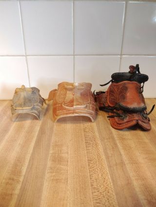 Toy Model Horse Saddles.  1 Leather,  2 Hard Plastic.