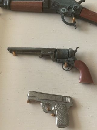 Vintage Mini Cast Iron Toy Guns On Wood Plaque,  Dead Or Alive Mares Laig Gun 3