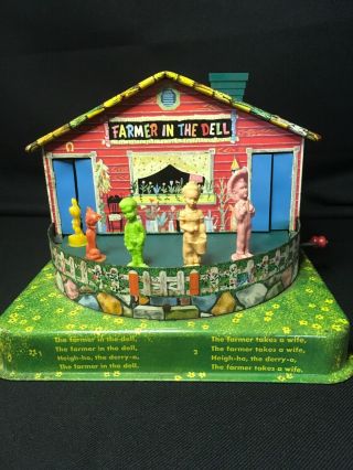 Vintage Tin Lithograph Musical Wind Up Toy Farmer In The Dell