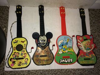 4 Vintage 1960s Guitar Toy,  Mattel,  Mickey Mouse Mousegetar,  Smurf,  Mother Goose
