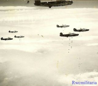 Org.  Photo: Aerial View Of B - 24 Bomber Group Dropping Bombs On Target Below