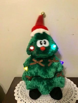 Singing,  Dancing,  Lighted Christmas Tree