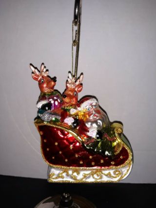 Blown Glass Christmas Ornament Of Santa In Sleigh With Presents And Reindeer