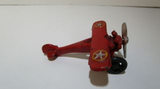 Vintage 4.  5 " Cast Iron Airplane Red Stars Wings Prop Turns Wheels Great