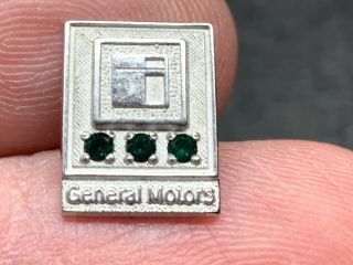 General Motors 1/10 10k Gold Triple Emerald Service Award Pin.