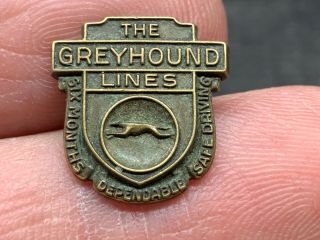 The Greyhound Lines Vintage Six Months Dependable Service Award Pin.