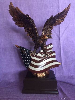 Wings Of Glory Bald Eagle Clutching An American Flag Statue Resin Figurine