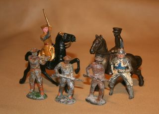 2 Vintage Britains Lead Toy Soldiers/ 1 On Horse / 1 Cast Iron / And 3 Soldiers