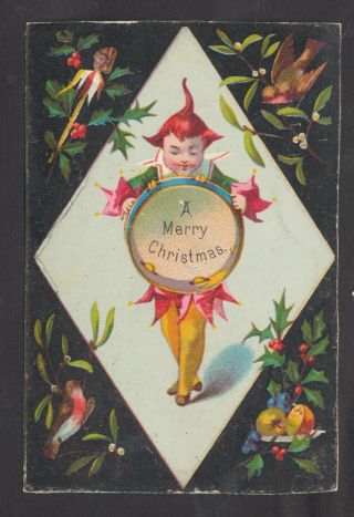 C9024 Victorian Xmas Card: Clown With Drum 1870s