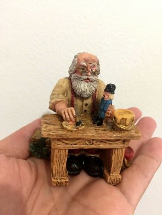 VINTAGE SANTA sitting on wood painting a toy soldier collectible figurine 3