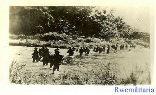 Port.  Photo: Move Out Us Combat Infantry Crossing Jungle River In Pacific; 1944