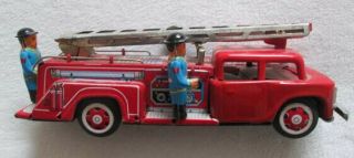 Sti Vintage Tin Toy Litho Fire Truck W/ Automatic Bumper Activated Fire Ladder