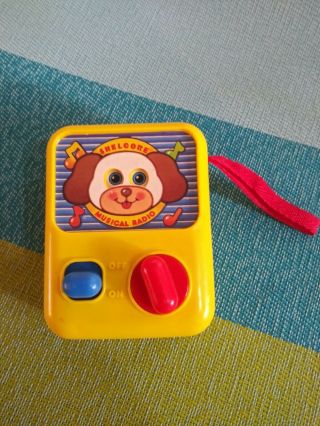 Vintage Shelcore Musical Radio Yellow Toy W/ Red Wristband Windup Moving Eyes