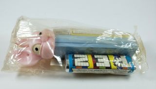 Pez Fat Earred Bunny In Cello Light Pink Head/pale Blue Stem Top Opened