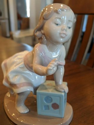 Lladro " My First Step " Baby Girl On A Block Figurine 6428.