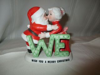 Santa And Mrs.  Claus Kissing Figurine George Good Corp.