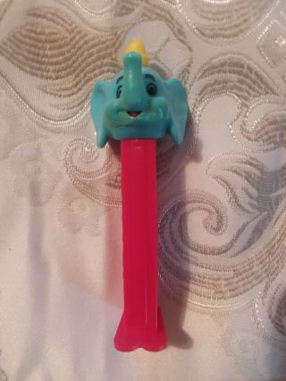 Old,  Dumbo Elephant Pez,  Pointy Top Hat.  Red Stem,  Blue Face,  Yellow Hat Redfeet