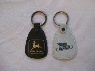 2 Vintage Dekalb,  John Deere Advertising Keychains