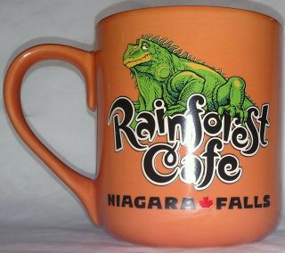 Iggy Rainforest Cafe Niagara Falls coffee mug green iguana orange 2000 16 oz 2
