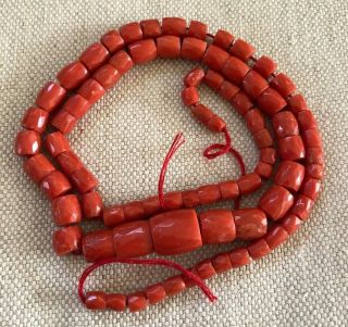 Vintage Strand Of Graduated,  Faceted Coral Beads