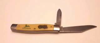 John Deere Colonial Prov.  U.  S.  A.  Yellow Handled 2 Blade Folding Knife Tractor