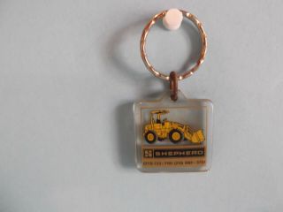 Old Unique Collectible Keychains 1.  " In Plastic Caterpillar 910 Loader