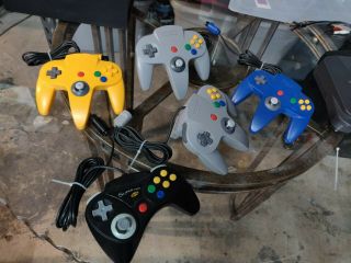Vintage Nintendo 64 Console with controllers and 43 games very good conditions 2