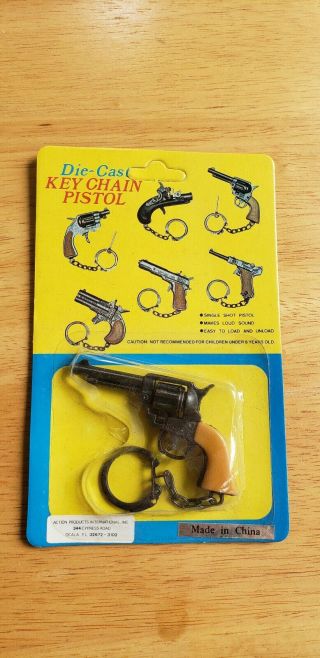 Vintage Die - Cast Keychain Revolver Pistol On Card