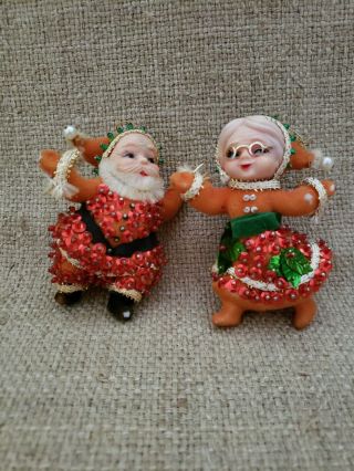 Vintage Flocked Sequined Dancing Santa & Mrs Claus Plastic Christmas Ornaments