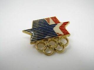 Vintage Collectible Pin: Olympic Rings Stars Design