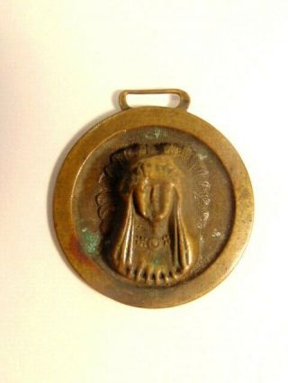 Old Brass Coored Fob Showing Native American / Indian Chief With Featured Bonnet