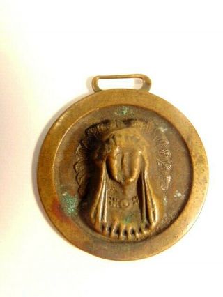 old brass coored fob showing Native American / Indian Chief with featured bonnet 3